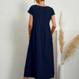 Gabrielle | Midi Kjole med Flydende Design og Tidless Elegance